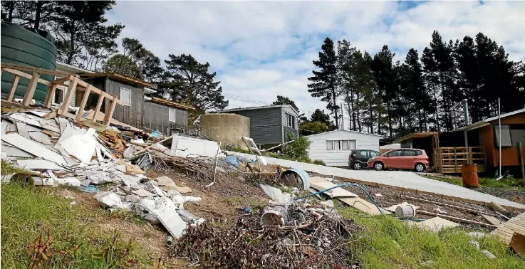  ?? DAVID WHITE/FAIRFAX NZ ?? Augustine Lau is developing this Paremoremo Rd site which neighbours describe as ‘‘slumsville’’.