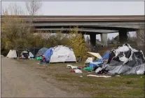  ?? NHAT V. MEYER — STAFF ARCHIVES ?? Tents just south of Highway 85in San Jose on Dec. 19.