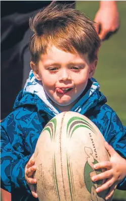  ?? Picture: Steve MacDougall. ?? Caleb MacPherson, 3, has a go at walking rugby during sessions at Montrose.