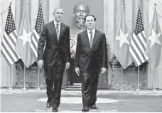  ?? CAROLYN KASTER, AP ?? President Obama and Vietnamese President Tran Dai Quang in Hanoi on Monday. The communist nation is ranked as corrupt.