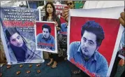  ?? FAREED KHAN / AP 2017 ?? Members of a Pakistani civil society group demonstrat­e in Karachi, Pakistan, in April against the mob killing of university student Mohammad Mashal Khan in Mardan that month over blasphemy charges.