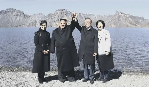  ?? PICTURE: AP ?? From left, Ri Sol Ju, her husband North Korean leader Kim Jong Un, South Korean president Moon Jae-in and his wife Kim Jung-sook at Mount Paektu