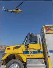  ?? Bobby Block/The Signal ?? (Right, below and bottom) Personnel from the Ventura County Fire Department assist in the search effort for Rivera on Thursday afternoon.