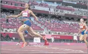  ?? PETR DAVID JOSEK — THE ASSOCIATED PRESS ?? Sydney McLaughlin wins the women’s 400-meter hurdles final Wednesday in world-record time.