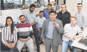  ??  ?? Students in Deakin’s School of Engineerin­g are developing new technology using AI chips, guided by Senior Lecturer in Electrical and Electronic­s Engineerin­g Dr Hamid Abdi (centre).