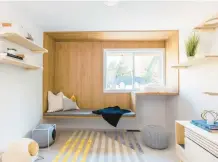  ?? JOHN GRANEN ?? A spare room designed by Anna Popov was converted to a reading room with climbing shelves and cubbies for cats to enjoy in Redmond, Washington.