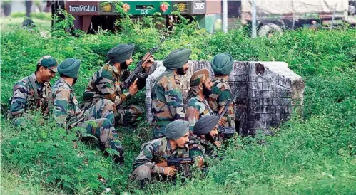  ?? AFP ?? SOLDIERS DURING AN ATTACK BY MILITANTS ON AN ARMY CAMP AT MESAR IN JAMMU ON SEPTEMBER 26