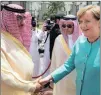  ?? PICTURE: AP ?? German Chancellor Angela Merkel greets Saudi Crown Prince Mohammed bin Naif bin Abdulaziz after arriving in Jeddah, Saudi Arabia, at the weekend.