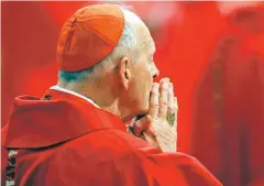  ?? AP FILE PHOTO ?? U.S. Cardinal Theodore McCarrick attends Mass in 2005 in St. Peter’s Basilica at the Vatican. Allegation­s that the disgraced ex-cardinal engaged in sex with adult seminarian­s have inflamed a long-running debate about the presence of gay men in the Roman Catholic priesthood.
