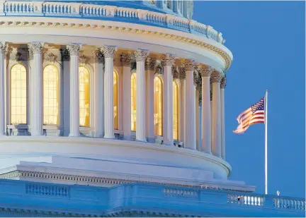  ?? AP ?? The American flag flies on the Capitol Dome in Washington.