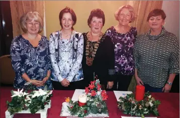  ??  ?? The winners of the Christmas table competitio­n at the ICA Federation meeting: Marie Porritt (Oulart) - 1st; Theresa Donnelly (Gorey) - 2nd; Mary D’Arcy, Federation president; Betty Crean (Bree) - 3rd; and Catherine Dunleavy, competitio­ns secretary.