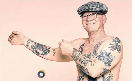  ??  ?? SKIN DEEP: Barend de Wet’s body was adorned with a variety of tattoos. His skill with a yo-yo enabled him to win a championsh­ip in the US