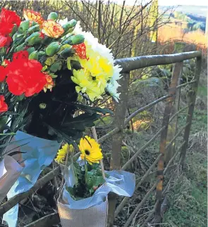  ??  ?? Flowers left close to the scene of the toddler’s death.