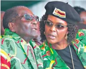  ??  ?? Robert Mugabe with his wife Grace, who is accused of failing to hand herself in for questionin­g over the assault claims