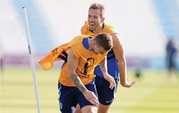  ?? Alex Pantling ?? > Harry Kane and Kieran Trippier train at the Al Wakrah SC Stadium in Doha yesterday ahead of tonight’s World Cup clash with USA tonight