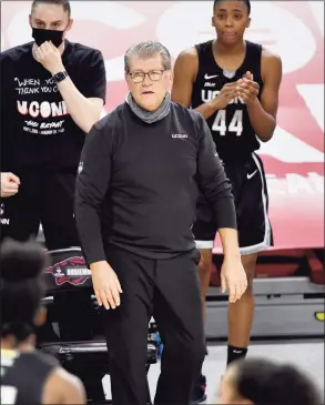  ?? Michael Woods / Associated Press ?? UConn coach Geno Auriemma reacts to a call during the second half against Arkansas on Thursday.