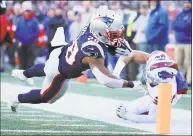  ?? Jim Rogash / Getty Images ?? The Patriots’ James White rushes for a 27-yard touchdown against the Bills on Dec. 23.