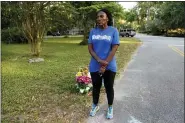  ?? SARAH BLAKE MORGAN — THE ASSOCIATED PRESS ?? In this May 17, 2020, photo, Wanda Cooper-Jones stands near the spot where her 25-year-old son Ahmaud Arbery was shot and killed while jogging through a Brunswick, Ga., neighborho­od. She says her son ran every day to clear his mind.