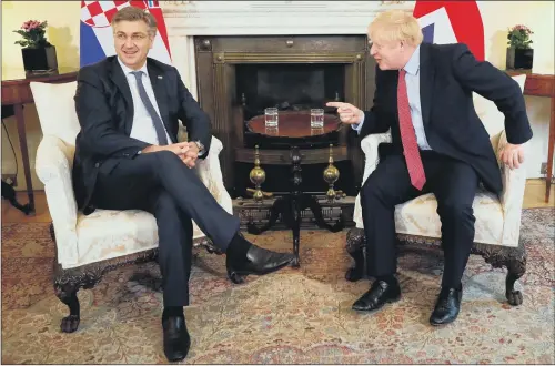  ?? PICTURE: TOLGA AKMEN/AFP/GETTY IMAGES ?? SOFT SELL: Prime Minister Boris Johnson with Andrej Plenkovic, the Prime Minister of Croatia, at Downing Street yesterday.