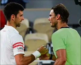  ?? (Photos AFP) ?? Il y a un an, Novak Djokovic avait sorti Rafael Nadal en demi-finale après un match dantesque (3-6, 6-3, 7-6, 6-2).