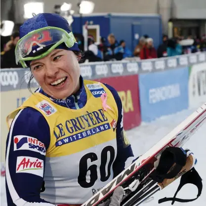  ?? FOTO: LEHTIKUVA / MARKKU ULANDER ?? Krista Pärmäkoski såg till att ge sig själv en tidig julklapp när hon slutade trea i Davos. Nu ska finländska­n hem och ladda för Tour de Ski.