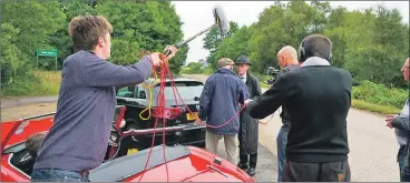  ??  ?? A vintage 1959 classic Austin Healey is included in the production in an outdoors scene shot on the roadside.