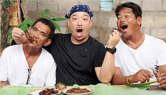  ??  ?? Fun-loving: HiddenCiti­es:extreme host Simon yin (centre) says being on the show gives him the opportunit­y to try everything from horseback archery in Malaysia to eating grub worms in Vietnam.
