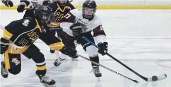  ?? CLIFFORD SKARSTEDT EXAMINER FILE PHOTO ?? Minor Peewee AAA Petes' Declan Ready controls the puck against North Central Predators' Cole Emerton during the
Pat Larock Memorial AAA Hockey Tournament on Sept. 19 at the Evinrude Centre in Peterborou­gh.