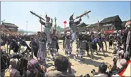  ??  ?? Yi people in traditiona­l costumes celebrate a festival in Huaihua, home to a variety of ethnic groups.