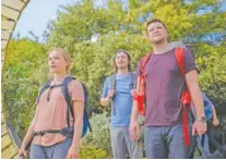  ?? GABOR KOTSCHY/A24 VIA AP ?? Jack Reynor, right, and Florence Pugh, left, appear in a scene from “Midsommar.”