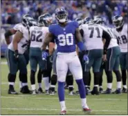  ?? FRANK FRANKLIN II — ASSOCIATED PRESS ?? Giants defensive end Jason Pierre-Paul reacts New York’s victory at MetLife Stadium on Sunday.