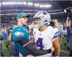  ?? RON JENKINS/ASSOCIATED PRESS ?? Quarterbac­ks Carson Wentz, left, and Dak Prescott will square off Sunday when the Philadelph­ia Eagles visit the Dallas Cowboys.