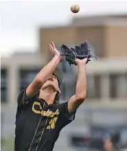  ?? STAFF PHOTO BY TROY STOLT ?? Calhoun pitcher Cooper Evans catches an infield fly ball on Wednesday at Notre Dame. Calhoun won 7-1.