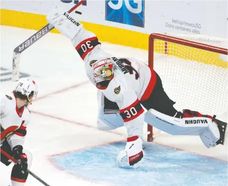  ?? PAUL CHIASSON/THE CANADIAN PRESS ?? Ottawa Senators goaltender Matt Murray, leaping here to deflect a shot Thursday night, shut the door early.