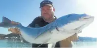  ??  ?? BIG HAUL: Edward Stopforth with a pignose grunter at Swartkops