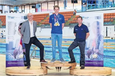  ?? ?? Partnershi­p Brian Lironi of Scottish Water, Olympic swimmer Duncan Scott and Euan Lowe of Scottish Swimming