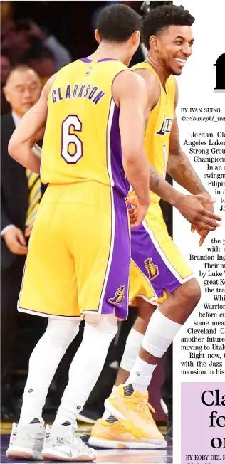  ?? HARRY HOW/AGENCE FRANCE-PRESSE ?? JORDAN Clarkson and Nick Young celebrate while manning the backcourt of the Los Angeles Lakers from 2014 to 2017.