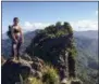  ?? RICHARD GRAHAM VIA AP ?? In this Sunday photo provided by Richard Graham, Lauren “Kimi” Worrell stands atop a rock peak not long before she died, at Castle Rock near the town of Whitianga in New Zealand. The family of the American scientist is urging other climbers to carefully consider their reliance on equipment that’s been left permanentl­y attached to rock faces.