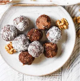  ?? PHOTO COURTESY OF CALIFORNIA WALNUTS ?? Valentine’s Day is Tuesday, and Walnut Chocolate Bliss Balls can be a nice surprise.