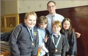  ??  ?? The Dromahane School team who were Mallow Credit Union Quiz winners in the Junior U/11 section: Aine Mary O’Rourke, Massimilia­no Conraler, Donnchadh O’Donoghue Cronin and Katlyn Quirke pictured with Quiz Master Andy Murphy.