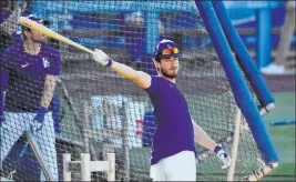  ?? Mark J. Terrill The Associated Press ?? Los Angeles Dodgers first baseman Cody Bellinger swings a mean bat, hitting .305 with 47 home runs and 115 RBIS last season to capture the National League MVP.
