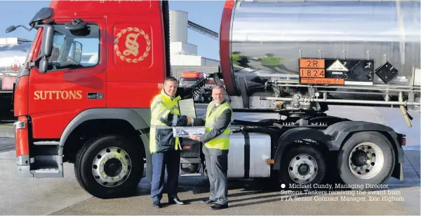  ??  ?? Michael Cundy, Managing Director, Suttons Tankers receiving the award from FTA Senior Contract Manager, Eric Higham