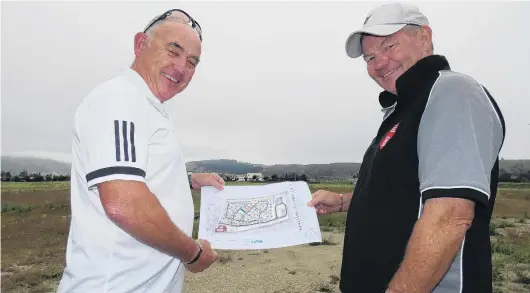  ?? PHOTO: SIMON HENDERSON ?? Close to home . . . Clyde property owners Patrick Houlahan (left) and Mark Laing hope a retirement village will help retirees stay near family.