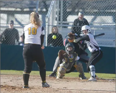  ?? Terrance Armstard/News-Times ?? In the box: Smackover's Karli Goocher waits on a pitch during a game against Harmony Grove during the 2019 season. Heading into Friday's play, the Lady Bucks were off to a 2-0 start on the young season.