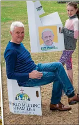  ??  ?? take a pew: John McGarry and daughter Lucy, 10, test souvenir chair and, inset, souvenirs on sale in Veritas