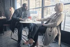  ??  ?? Omar Sy and Ludivine Sagnier in a scene from
Lupin.