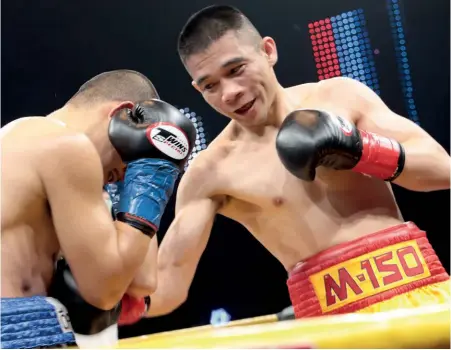  ?? Photo: WP BOXING ?? MARKSMAN: Srisaket goes to work on Kwanthai’s body