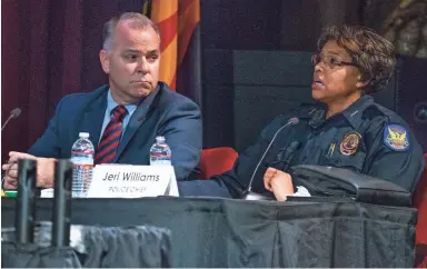  ?? PHOTOS BY TOM TINGLE/THE REPUBLIC ?? Phoenix City Manager Ed Zuercher, left, listens as Police Chief Jeri Williams makes a point during the Phoenix City Council meeting Tuesday at the Orpheum Theatre in downtown.