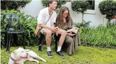  ?? ?? A DOG’S LIFE: Myra the bull terrier, Nicholas Wanckel and Lisa Huber share a literary connection.