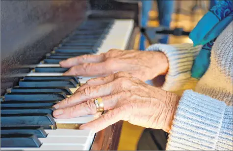  ?? COLIN CHISHOLM ?? Elizabeth Smith, who learned how to play on an old pump-organ when she was a young girl, says the great thing about music is that age isn’t a barrier.